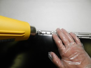 Langkah 2 — Melepas Perekat Kamera