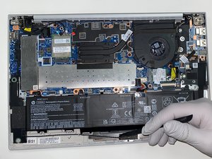 Langkah 2 — Lepaskan Kabel Baterai