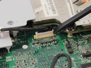 Langkah 6 — Melepas Kabel Trackpad dan Komponen Pendukung
