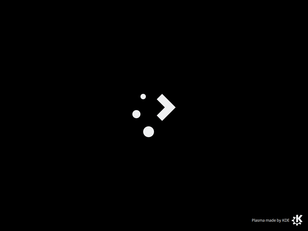 Layar hitam dengan logo Plasma berupa tiga bulatan putih dan tanda panah, serta tulisan Plasma made by KDE di pojok kanan bawah