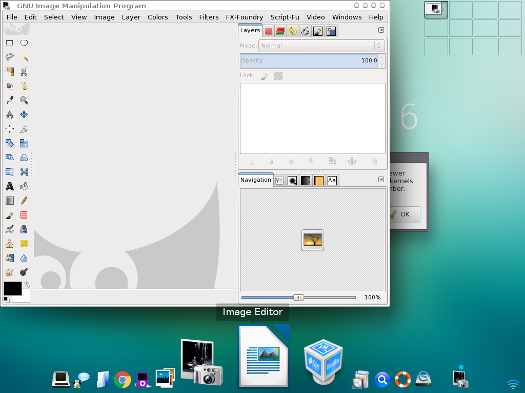 Desktop Enlightenment Elive dengan latar hijau toska berangka 6, jendela GNU Image Manipulation Program terbuka, dock ikon besar di bawah dengan tooltip Image Editor