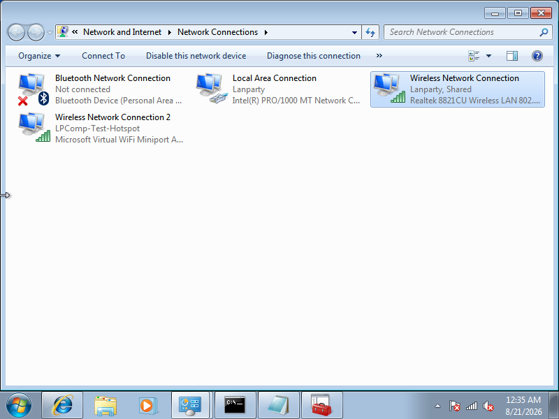 Network Connections menunjukkan Wireless Network Connection berstatus Shared dan Wireless Network Connection 2 sudah bernama sesuai SSID hotspot