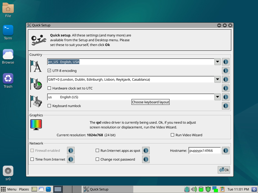 Jendela Quick Setup BookwormPup64 berisi pengaturan Country en_US, keyboard layout US, resolusi grafis 1024x768, dan hostname puppypc14966, dengan tombol Ok di kanan bawah