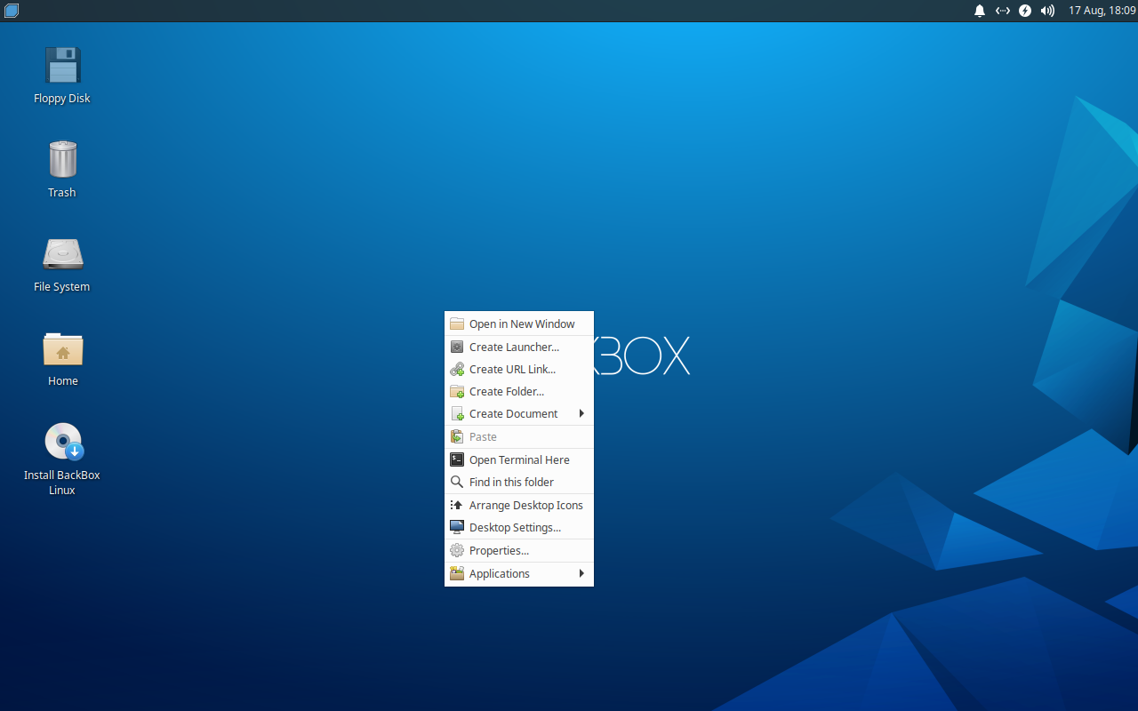 Menu klik kanan desktop BackBox berisi Create Launcher, Create Folder, Open Terminal Here, Desktop Settings, dan Applications