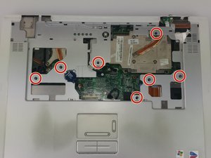 Langkah 5 — Melepas Screws Trackpad dan CMOS Battery