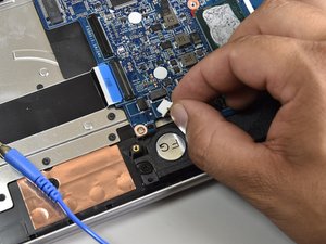 Langkah 6 — Lepaskan kabel ribbon