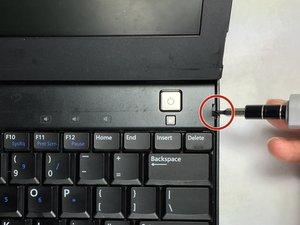 Langkah 2 — Lepaskan Panel Tombol Power
