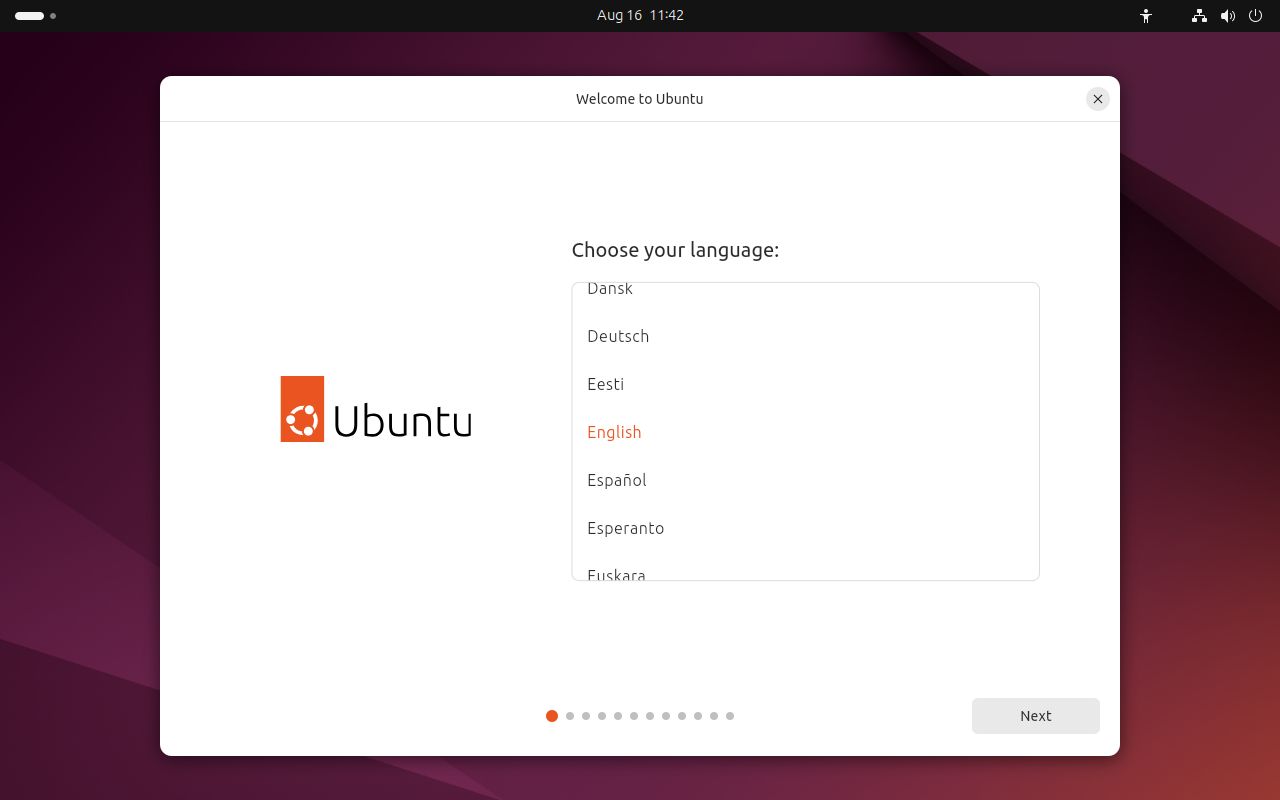 Layar Welcome to Ubuntu dengan daftar pilihan bahasa dan 12 titik penanda tahap
