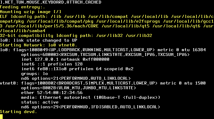 Log boot FreeBSD menampilkan proses mounting uzip image, jalur ldconfig untuk berbagai pustaka, konfigurasi jaringan lo0 dan vtnet0 aktif, serta Starting devd