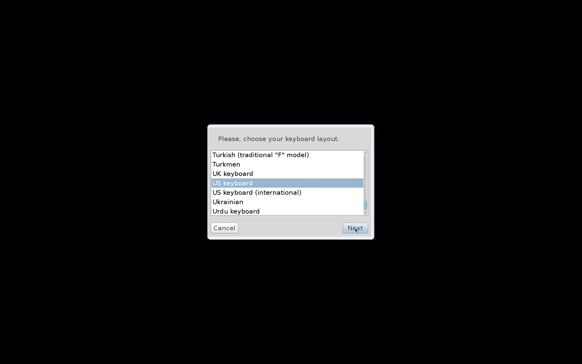 Dialog Please choose your keyboard layout pada pemasang Mandriva dengan US keyboard terpilih