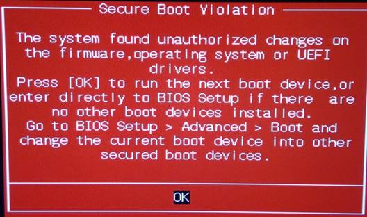 Layar merah bertuliskan Secure Boot Violation dengan pesan unauthorized changes