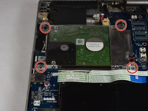 Langkah 4 — Lepaskan Skru Penahan Hard Drive