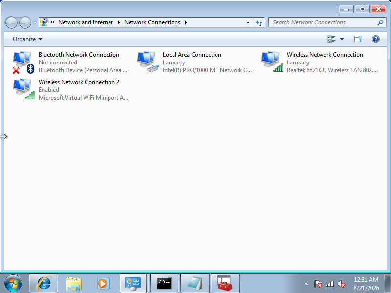 Network Connections menampilkan Wireless Network Connection asli dan Wireless Network Connection 2 sebagai adapter virtual