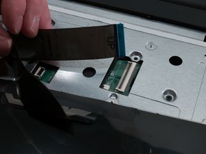 Langkah 9 — Melepas Kabel Pita