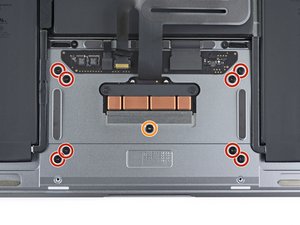Langkah 8 — Lepaskan Sekrup Trackpad