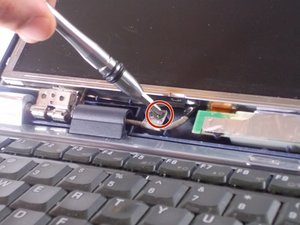 Langkah 6 — Melepas Sekrup Kabel Putih