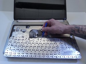 Langkah 7 — Lepaskan Screws Panel Atas