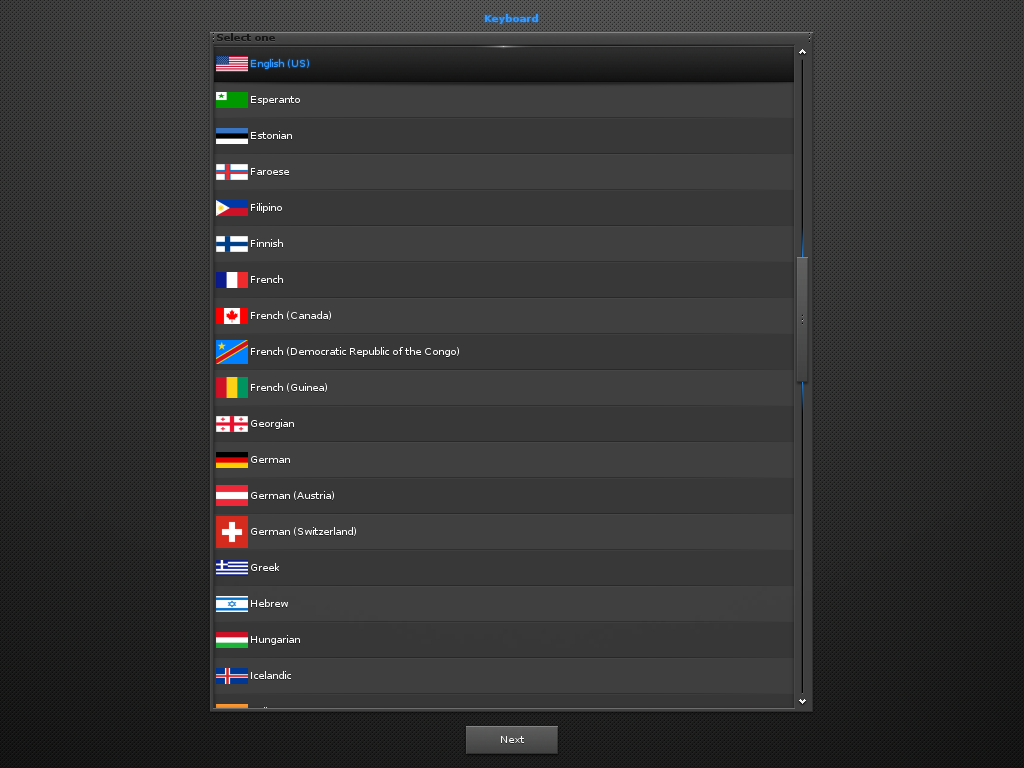 Dialog Keyboard Select one pada Elive berisi daftar tata letak papan ketik berikon bendera, baris English US tersorot biru, tombol Next di bawah