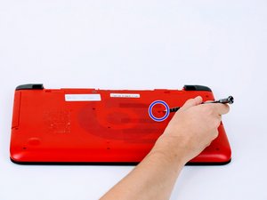 Langkah 2 — Lepaskan Penutup Sekrup Tersembunyi