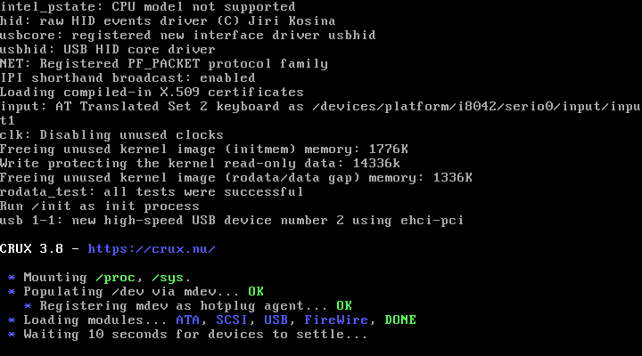 Log pesan kernel Linux saat boot CRUX 3.8 menampilkan deteksi driver HID, USB, dan proses mounting awal sebelum baris CRUX 3.8 - https://crux.nu/ muncul