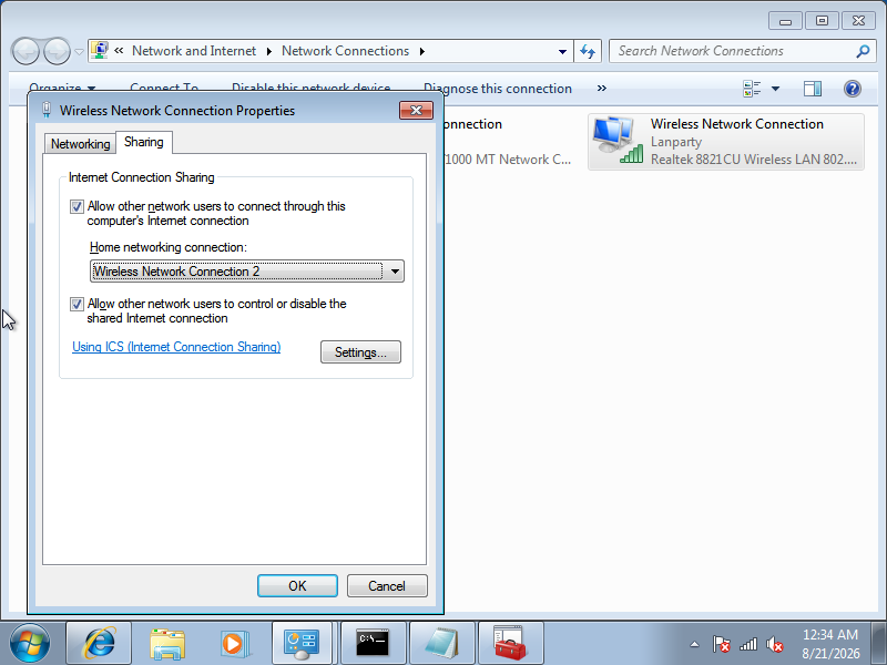 Tab Sharing pada Properties Wireless Network Connection dengan checkbox dicentang dan dropdown Home networking connection memilih Wireless Network Connection 2
