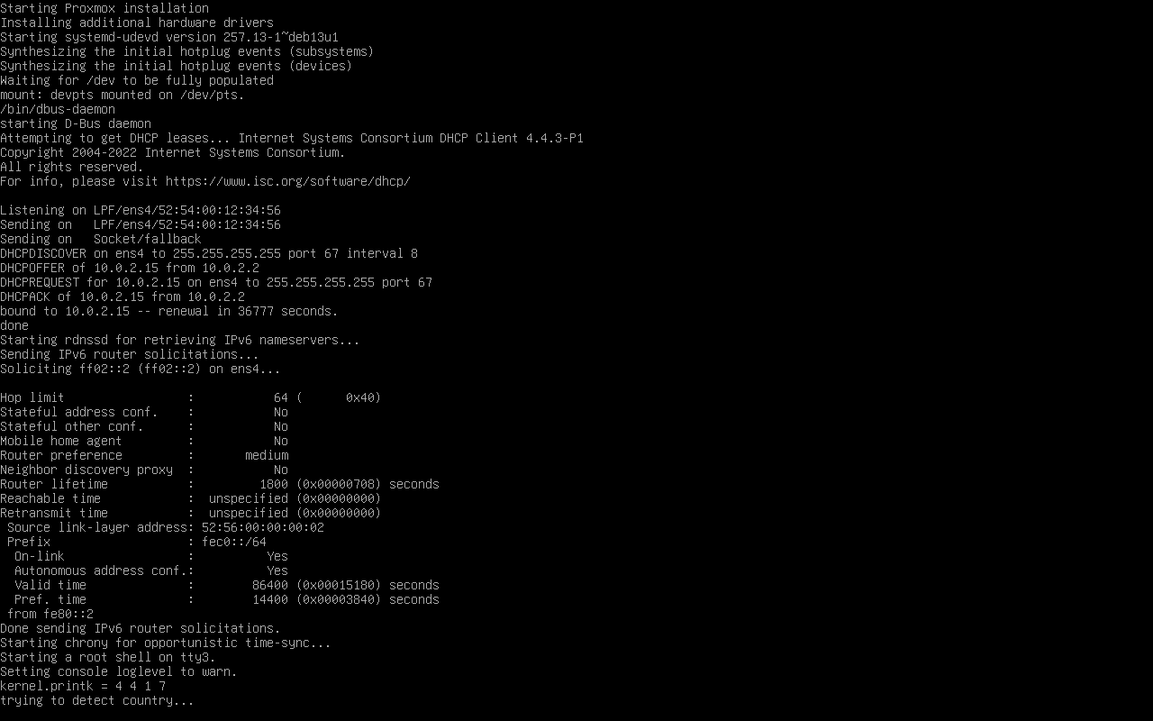 Kelanjutan log konsol instalasi Proxmox VE menampilkan DHCP berhasil mendapat alamat IP, deteksi IPv6, chrony time-sync dimulai, dan proses mendeteksi negara sebelum masuk mode grafis