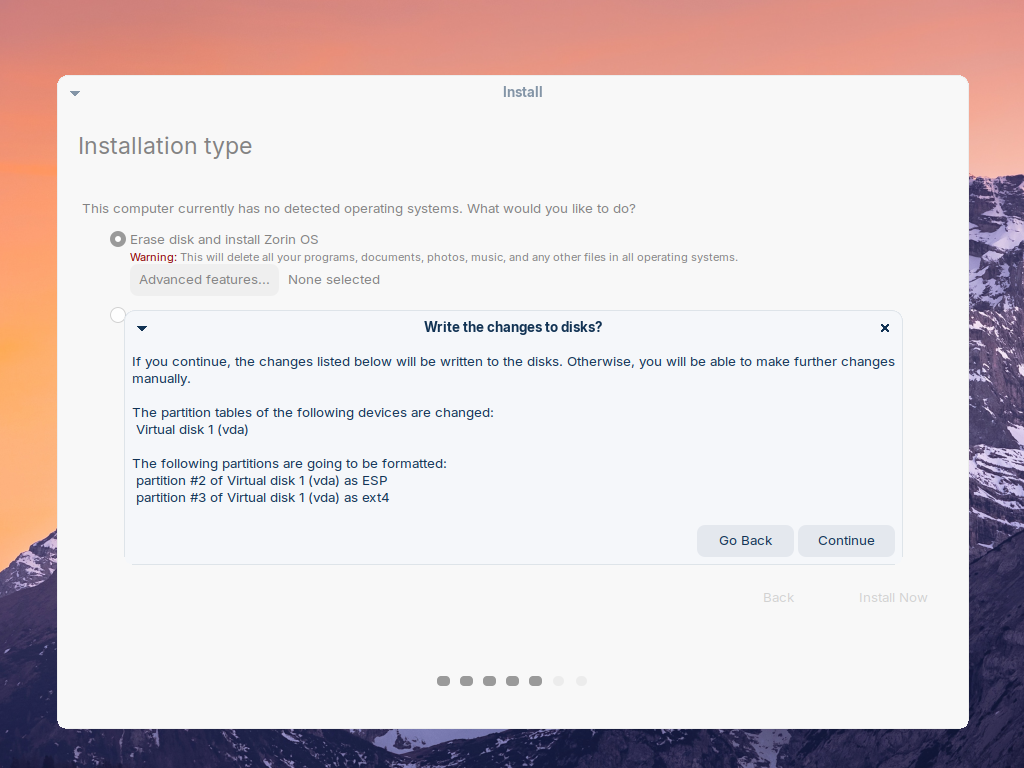 Kotak dialog Write the changes to disks berisi ringkasan partisi yang akan diformat