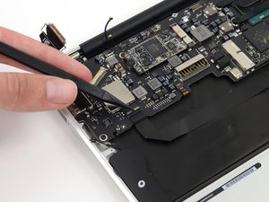 Langkah 8 — Lepaskan Kabel Trackpad