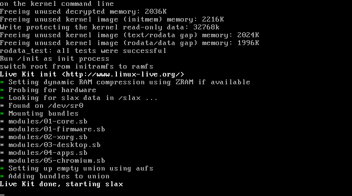 Layar teks proses boot Slax dengan tulisan Live Kit done starting slax