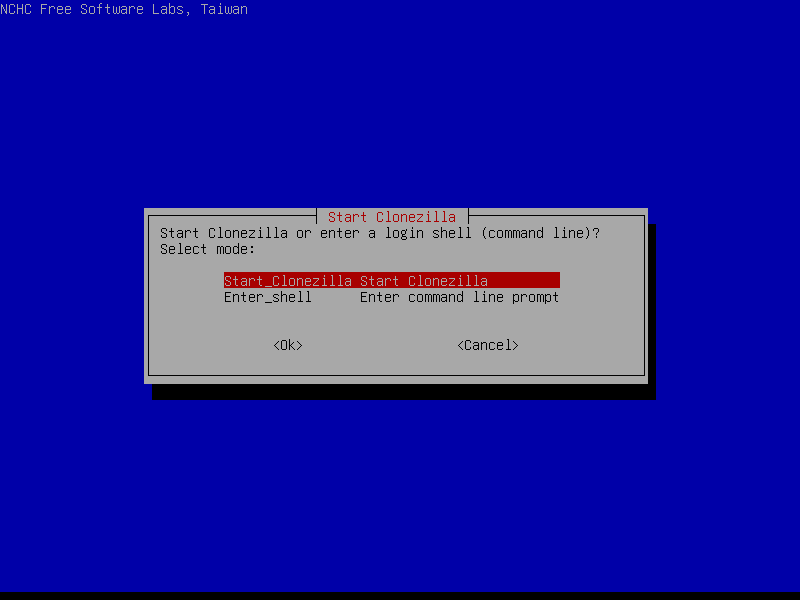Dialog Start Clonezilla menanyakan mode dengan pilihan Start_Clonezilla tersorot merah dan Enter_shell sebagai alternatif baris perintah