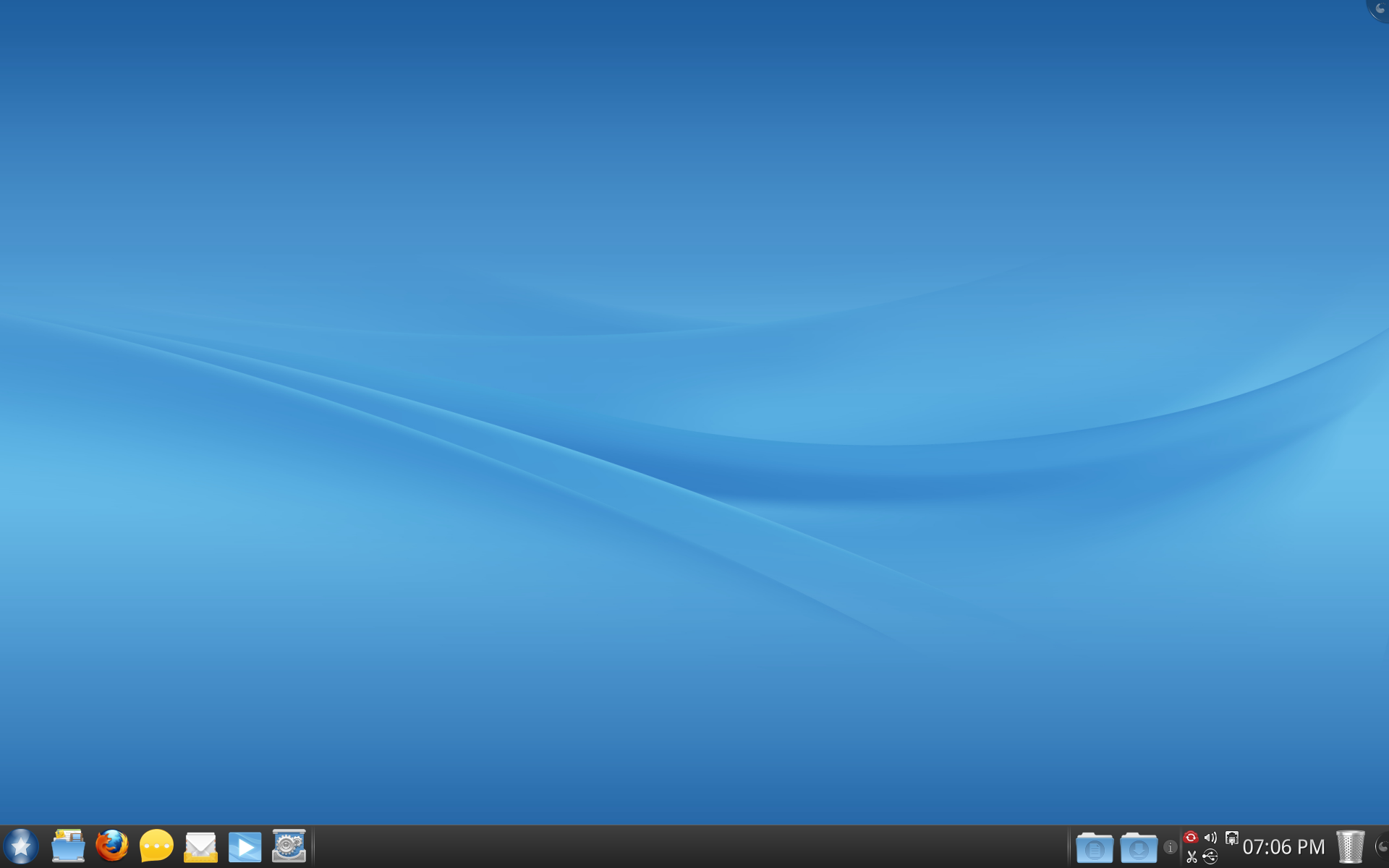 Desktop Mandriva 2011 dengan panel aplikasi di bagian bawah layar