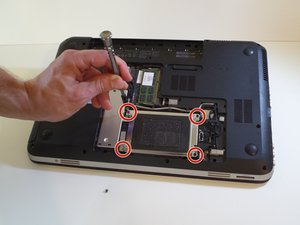 Langkah 4 — Lepaskan Screws Hard Drive