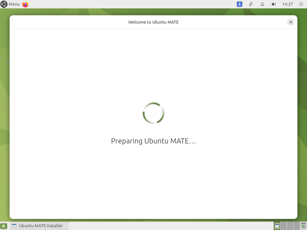 Jendela Welcome to Ubuntu MATE berisi lingkaran berputar dan tulisan Preparing Ubuntu MATE di tengah layar