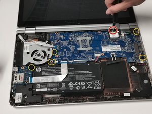 Langkah 5 — Lepaskan Sekrup Tambahan di Area Motherboard