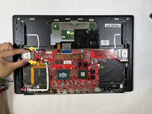 Langkah 2 — Lepaskan kartu Wi-Fi