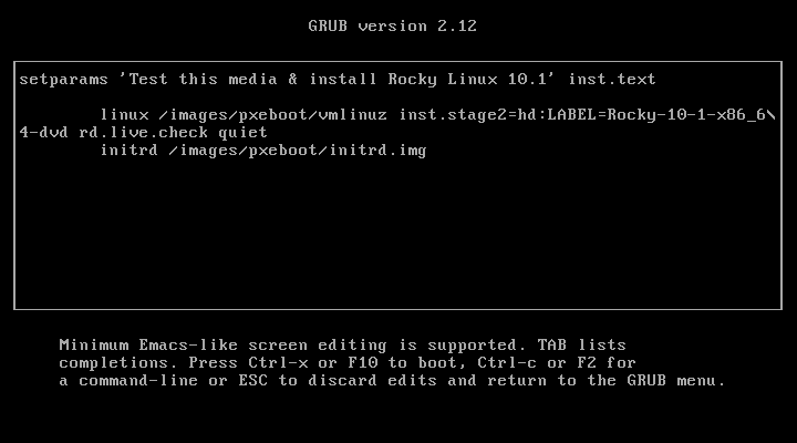 Layar edit GRUB yang sama setelah ditambahkan parameter inst.text di akhir baris setparams, mengubah baris menjadi setparams Test this media and install Rocky Linux 10.1 inst.text