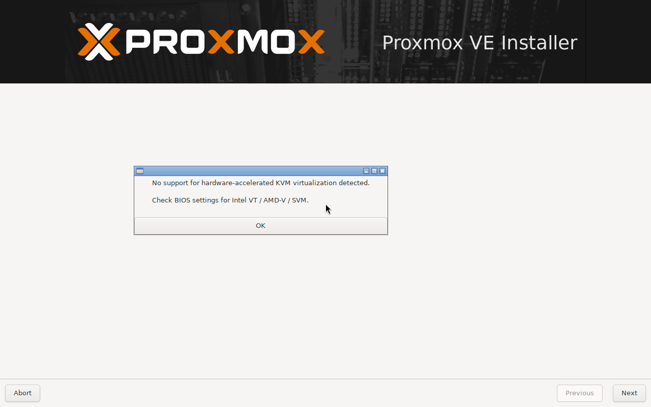 Kotak dialog peringatan No support for hardware-accelerated KVM virtualization detected - Check BIOS settings for Intel VT / AMD-V / SVM, di atas halaman Proxmox VE Installer yang masih kosong