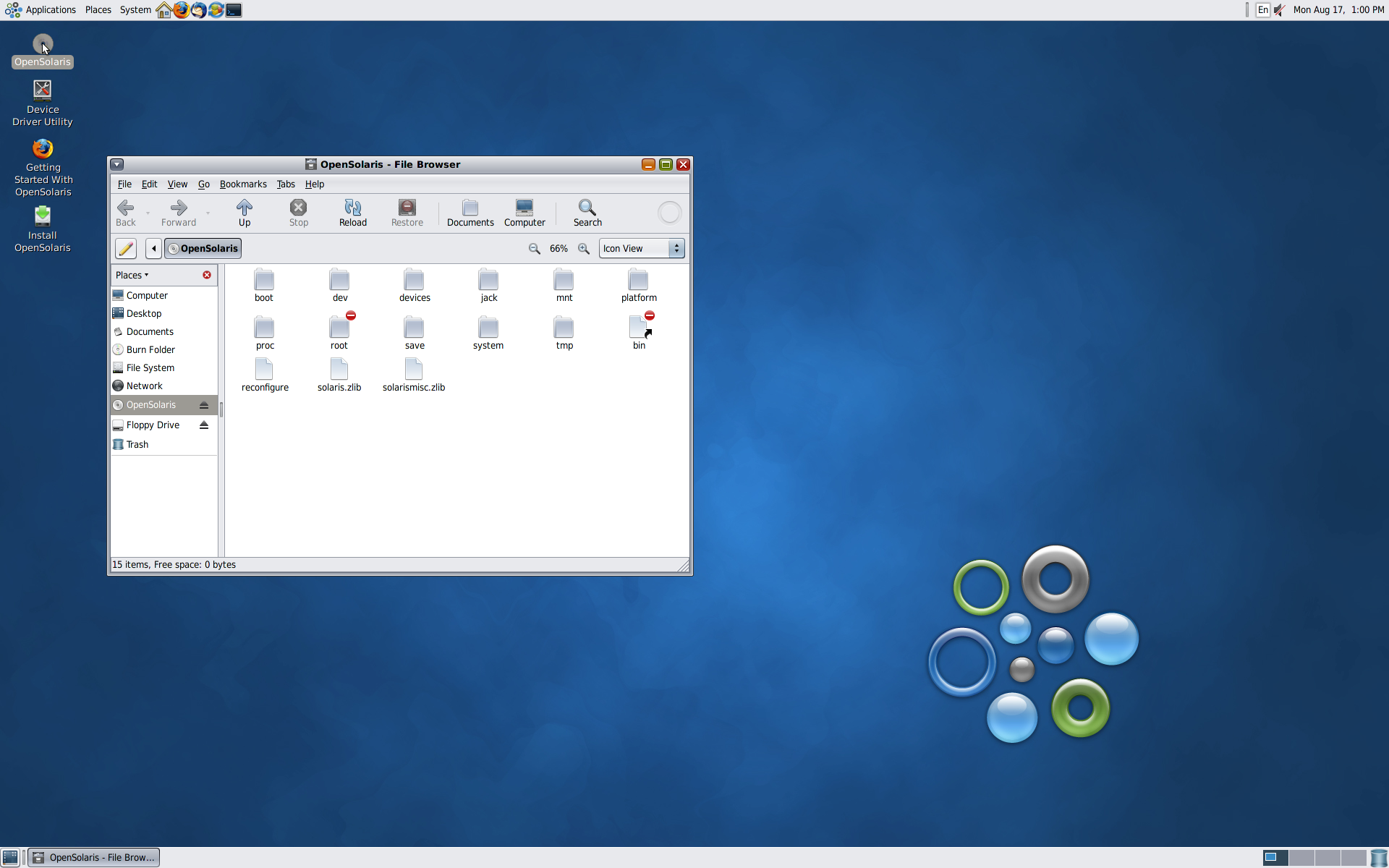 Pengelola berkas OpenSolaris menampilkan isi kepingan dengan folder boot, dev, devices, platform, system, dan berkas solaris.zlib