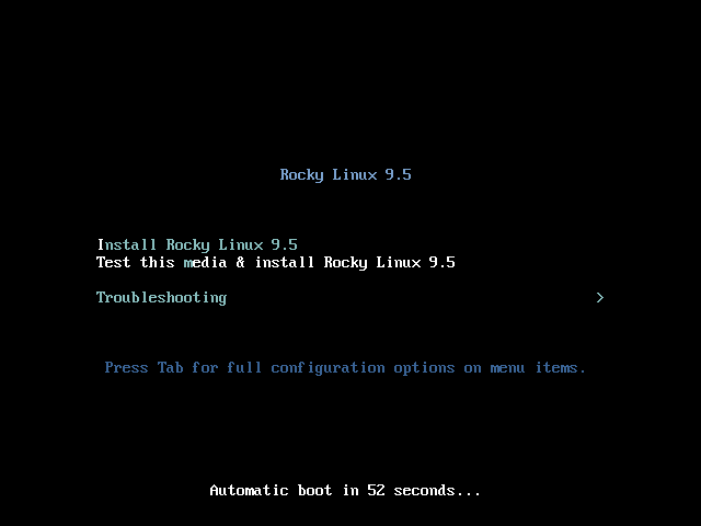 Menu boot Rocky Linux 9.5 dengan pilihan Install Rocky Linux 9.5, Test this media & install Rocky Linux 9.5, dan Troubleshooting, serta hitungan mundur boot otomatis 52 detik