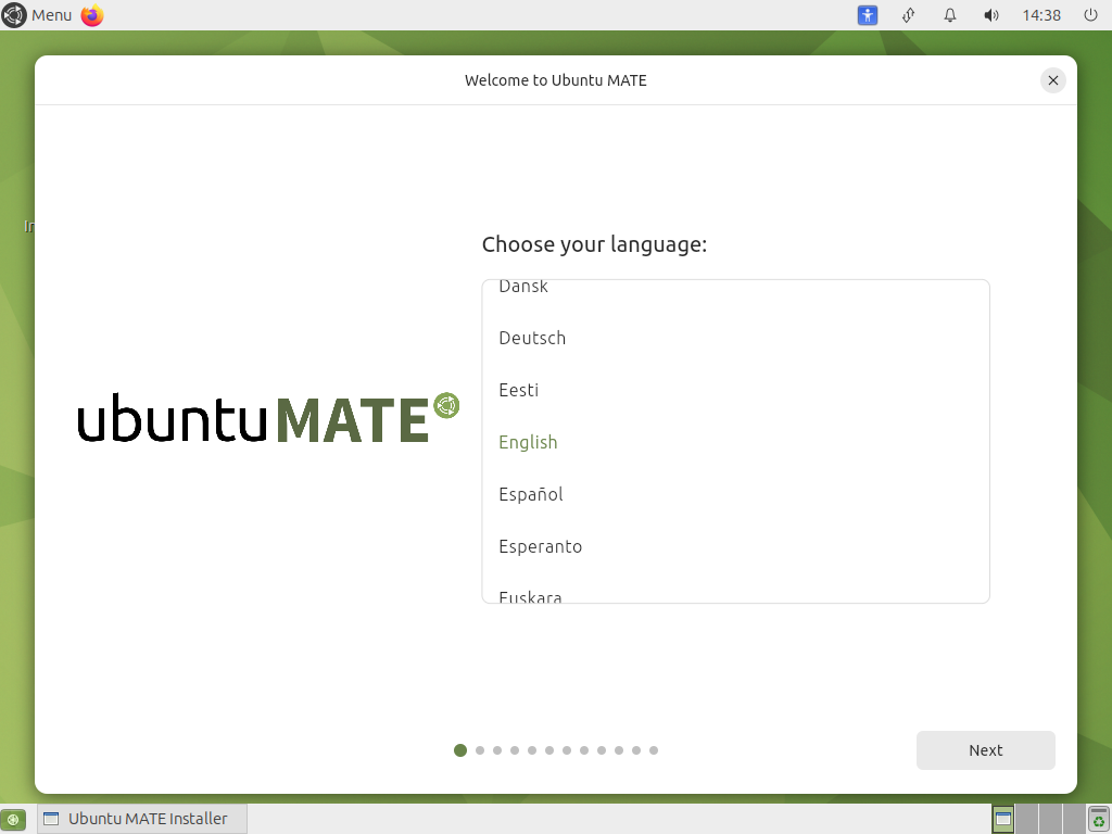 Layar Choose your language pemasang Ubuntu MATE dengan logo ubuntuMATE di kiri dan daftar bahasa Dansk Deutsch Eesti English Espanol Esperanto Euskara, English tersorot hijau