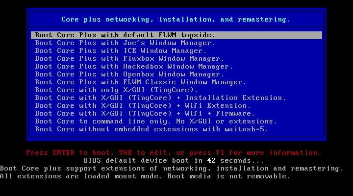 Menu boot Tiny Core dengan belasan pilihan window manager dan mode boot