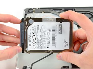 Langkah 4 — Melepas Kabel Hard Drive