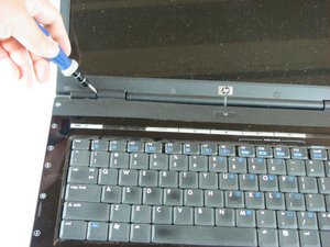 Langkah 2 — Buka Tutup Penutup Keyboard