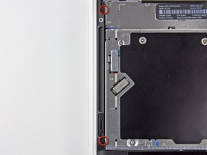 Langkah 8 — Menghilangkan Screws Penjepit Optical Drive