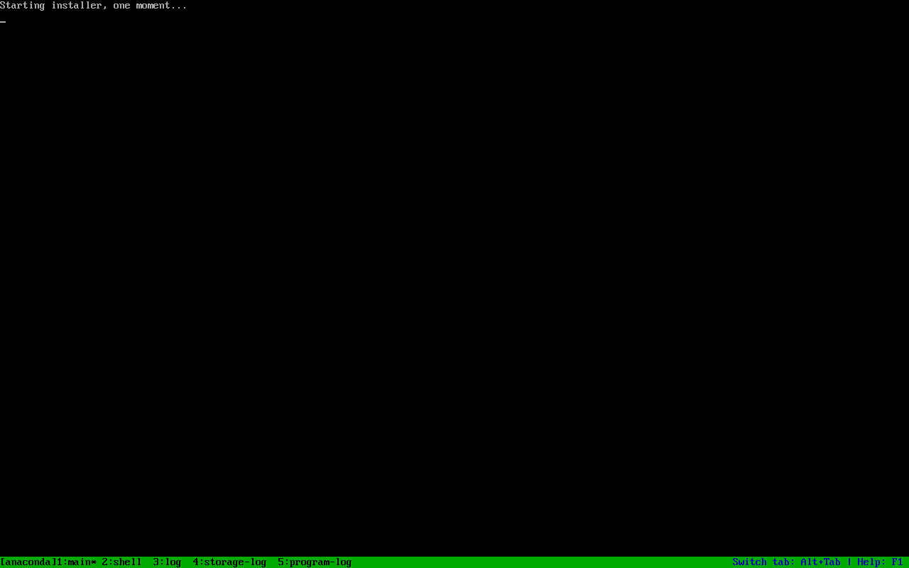 Layar hitam bertuliskan Starting installer, one moment dengan bilah status hijau di bawah berisi tab anaconda main, shell, log, storage-log, program-log