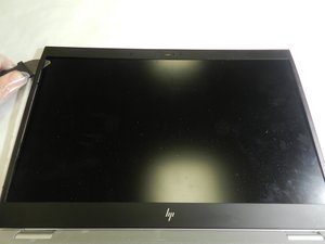 Langkah 1 — Mengangkat Bezel Kamera