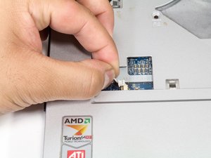 Langkah 7 — Lepaskan Kabel di Pojok Kiri Bawah