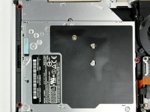 Langkah 7 — Lepaskan Optical Drive