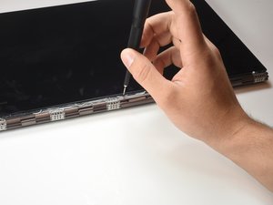 Langkah 3 — Lepaskan Sekrup di Bawah Penutup Logam