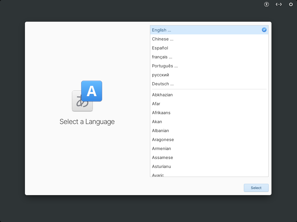 Layar Select a Language elementary OS dengan panel putih berisi daftar bahasa English tercentang biru diikuti Chinese Espanol francais dan daftar alfabetis Abkhazian sampai Avaric